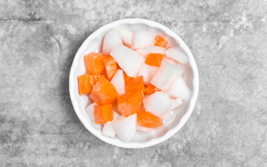 Top view Korean side dish pickled radish and carrot seasoning with vinegar, sugar and salt