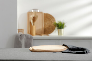 Wooden table in the kitchen on a beautiful spring day 