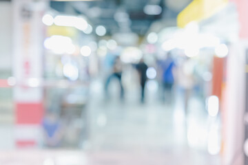 Abstract defocused or blurred background of the shopping mall with nice department store interior. which including of people and shop store.	
