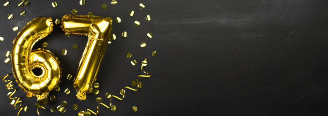 gold foil balloon number sixty seven. Birthday or anniversary card with the inscription 67. Black...