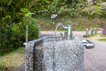 Naklejka na ściany i meble water drinking fountain in the public square