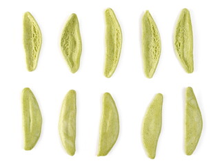 Dried durum pasta with spinach (foglie d'ulivo) in olive leaf shape set and collection isolated on white background, top view