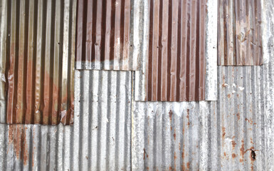 old rusty galvanized, corrugated iron siding vintage texture background