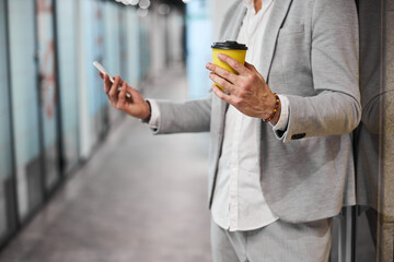 Close up of busy man checking email during break