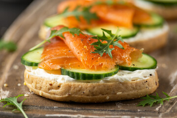Fresh bagel with Salmon, cream cheese and cucumber