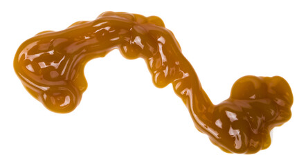 Liquid sweet caramel sauce isolated on white background close-up.