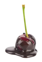 Red juicy cherries in chocolate isolated on white background close-up.