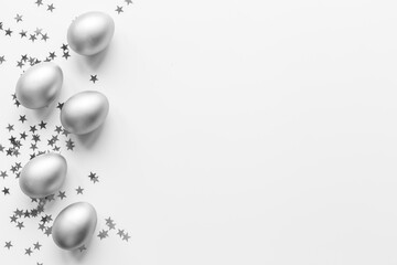 Silver Easter eggs with decoration. Wealth and good luck concept.