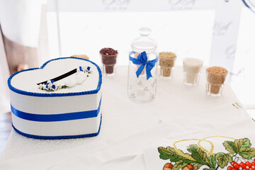 Details of wedding ceremony and tradition of making family amulet from different grain, indoor....