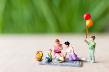 Couple of lesbian ladies having fun in the park with children