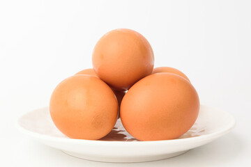 Yellow egg on white background