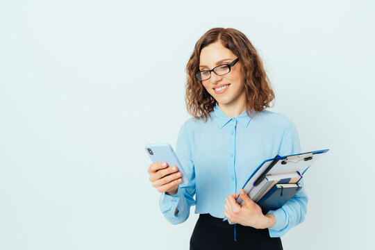 Happy Smiling Young Business Woman Wearing Glasses And Blue Shirt