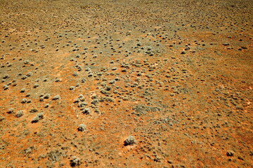 Flat desert plain with no trees