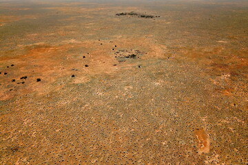 Flat desert plain with no trees