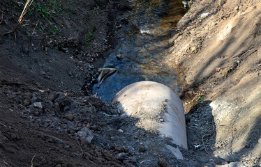 when building a new road, it is necessary to bridge the stream with the help of a metal pipe only...