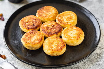 cottage cheese pancakes dessert cheesecake sweet curd breakfast syrniki healthy meal top view copy space rustic food background