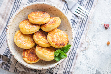 cottage cheese pancakes dessert cheesecake sweet curd breakfast syrniki healthy meal top view copy space rustic food background