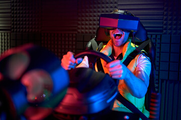 Fototapeta na wymiar Young man in virtual reality space
