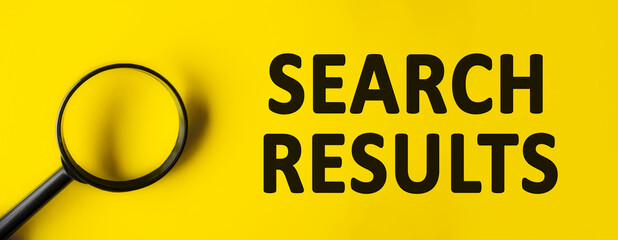 Magnifying glass on yellow background. Top view, flat lay. Minimal we are hiring background, job...