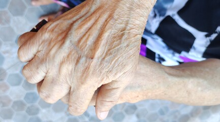 Hands of elderly woman.