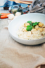 Risotto with fresh cream, salted chicken, rehydrated chips and mushrooms