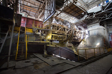 Stepnogorsk, Kazakhstan - April 19, 2012: Railway car dumper quick unload system. Mining and processing plant. Rotary mechanism.