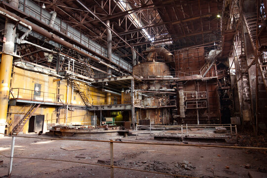 Stepnogorsk, Kazakhstan - April 04, 2012: Demolition of outdated Soviet sulfuric acid plant industrial building. Inside view.