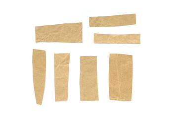 Recycled paper craft stick on a white background. Brown paper torn or ripped pieces of paper isolated on white background.