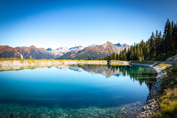 reflection in a lake at stubnerkogel, bad gastein, austria, mountains