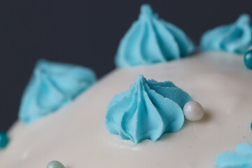pastry powder meringue cake decoration close-up macro, blurred background