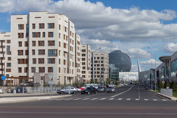 Nur-Sultan (Astana), Kazakhstan - 19.08.2017 - Expo town in the city of Nur-Sultan, the building of the muse sphere Nur-Alem is visible in the distance
