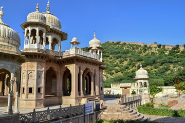 Complex of temples and tombs in Gatore Ki Chhatriyan, in contrast with the blue sky. Jaipur, India.