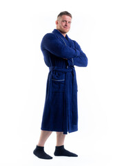 strong man in a Bathrobe on an isolated white background with a smile on his face.