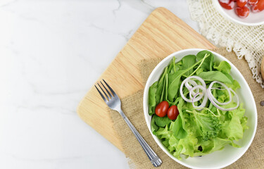 top view of salad form fresh green leaves mix and vegetables