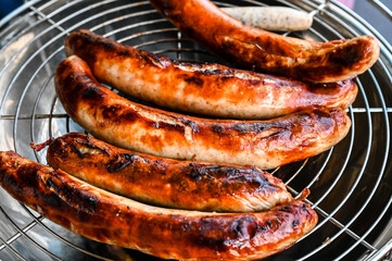 grilled sausages on the grill