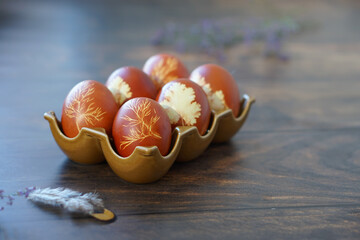 Easter eggs. Painted eggs on a wooden background. Traditional eggs for Easter in Russia.