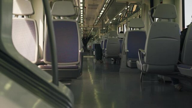 Modern european economy class fast train interior. Inside of high speed train compartment