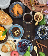 top View of a wooden rustic table with several ingredients for cooking
