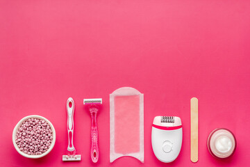 Naklejka premium Epilation concept. Set of epilator with wax strips and razor, flat lay
