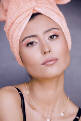 Fototapeta premium woman with pink make up at home. Get ready for going out
