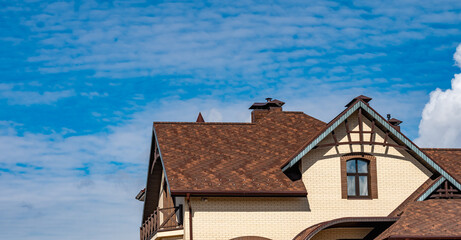 house with a gable roof window