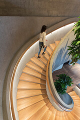 Modern interior view of spiral staircase, viewed from top
