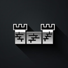 Obraz premium Silver Great wall of China icon isolated on black background. Long shadow style. Vector