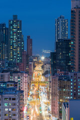 Fototapeta premium Night scenery of busy street in downtown district of Hong Kong city
