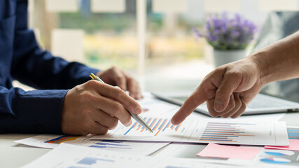 Businessmen do the work of analyzing the multiple possible cost graphs of the company.