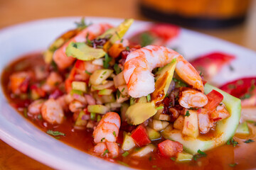 Traditional Mexican seafood. Aguachile, Mexican seafood food with copy space. Mexican seafood on wooden table. Traditional Mexican food concept.