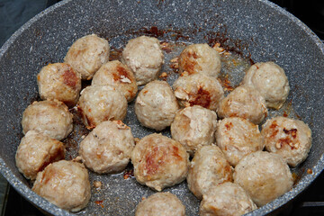 fried cutlets in a pan 