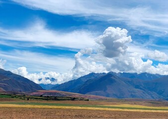 Andes mountains magnificent landscape near Urubamba Sacred valley in Peru. Incredible sky clouds.