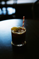 glass of coffee with orange 