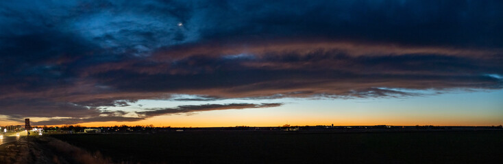sunset near small town in rural America